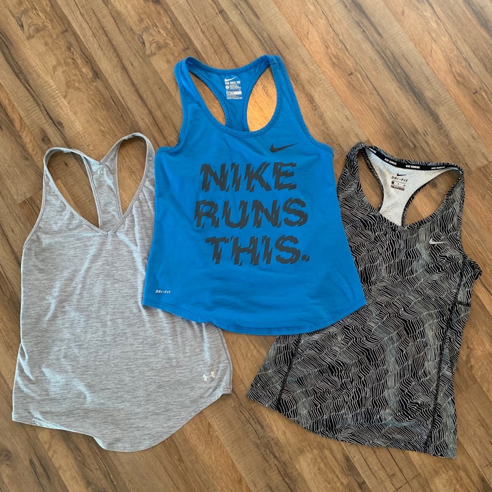 Three brand name workout tanks